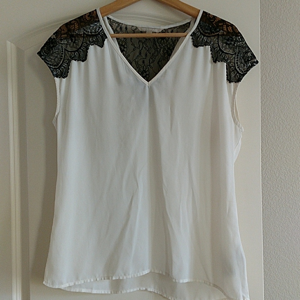 Black lace on cream blouse